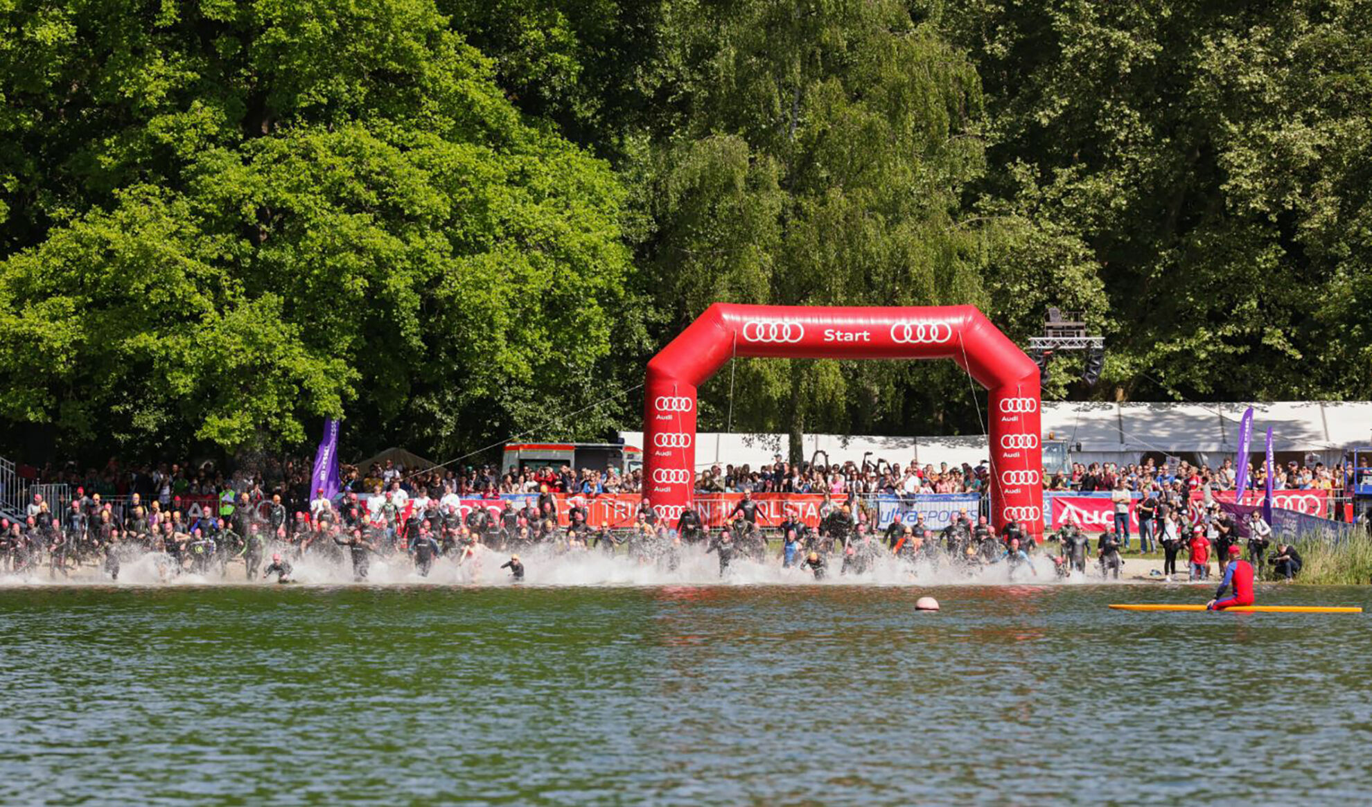 Good neighbor Audi strengthens region and acts as title sponsor at Triathlon Ingolstadt - This year too, numerous Audi employees will swim for their personal bests in the Ingolstadt quarry lake.