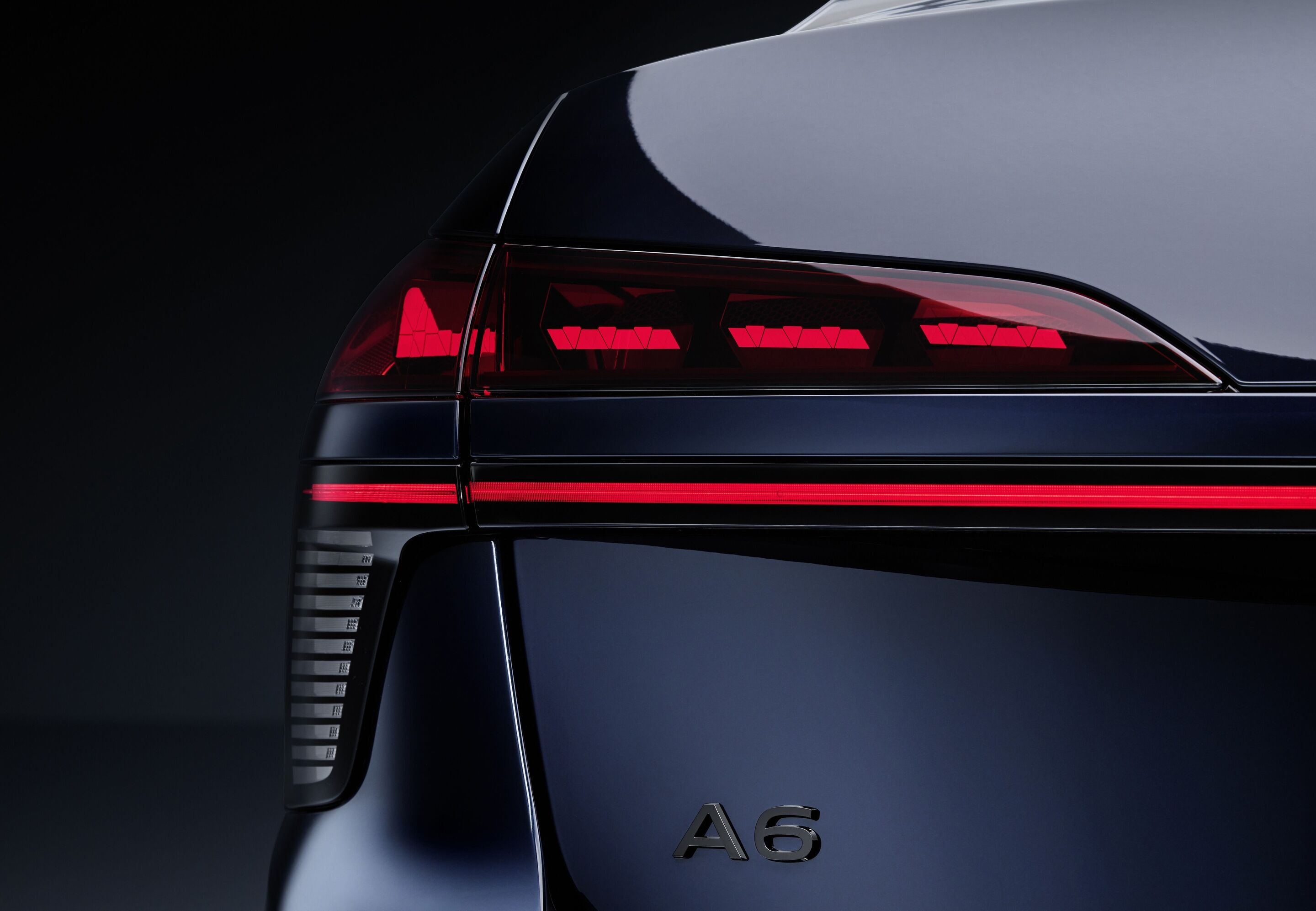 Audi A6 Sedan - Second-generation digital OLED rear lights are used in the new Audi A6 Sedan (shown here in Firmament blue metallic).